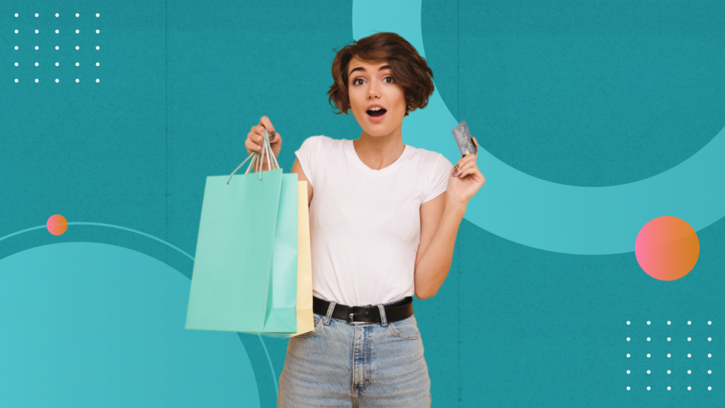 A woman in a white t-shirt holding shopping bags, being a happy client.